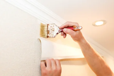 Pose de papier peint à l'Aiguillon — revêtements muraux et toiles de verre